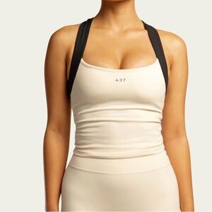 Looking for 437 black and white sculpt top and ballet top